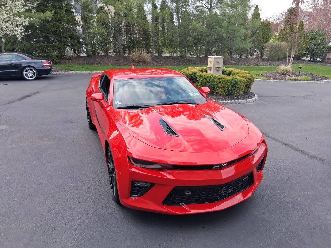 Red Chevrolet Camaro SS after an exterior detail