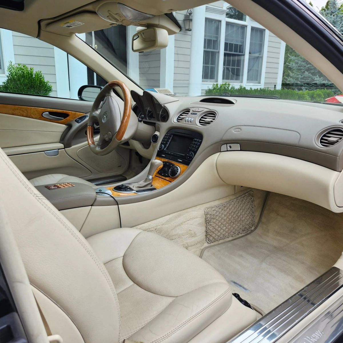 Clean tan leather interior of a Mercedes-Benz SL